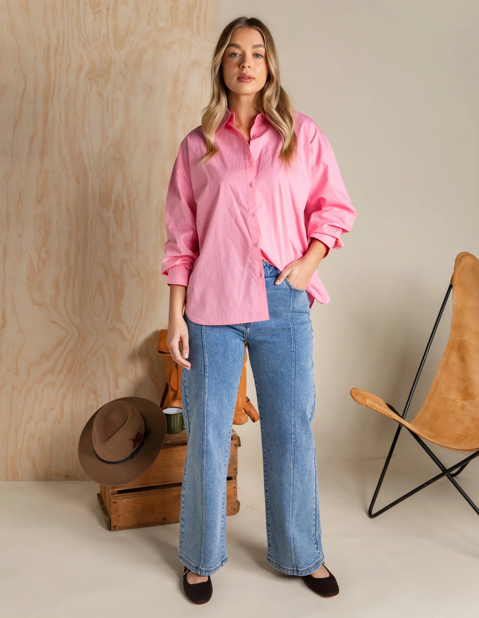 Foxwood Georgina Rose shirt displayed on a hanger with floral pattern and soft pink color, showcasing casual women's fashion.