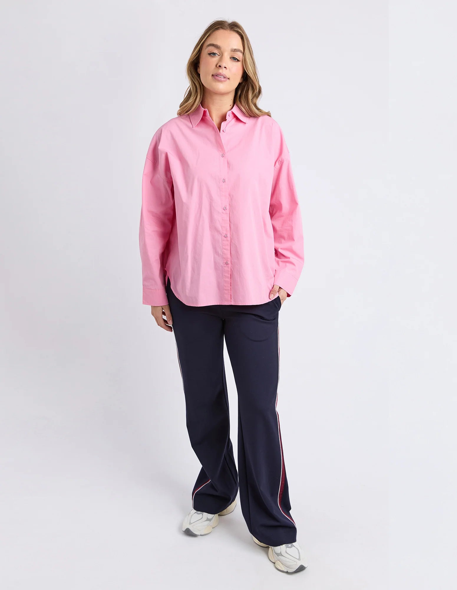 Foxwood Georgina shirt in rose color, lightweight fabric with a collared neckline and button front, displayed on a hanger.