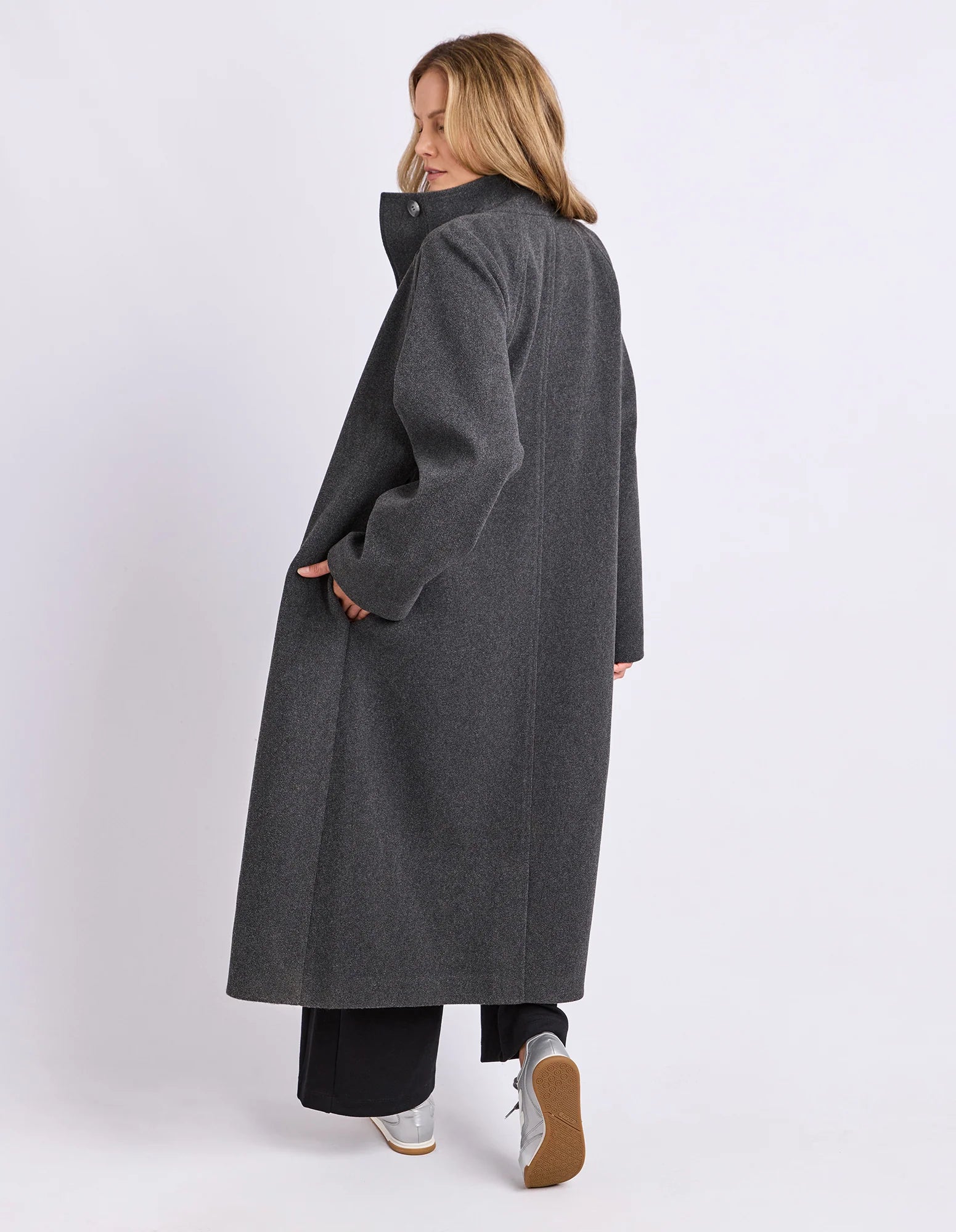 Fermont Coat in charcoal color by Foxwood, showcasing a stylish, warm winter coat with a sleek design and button details.