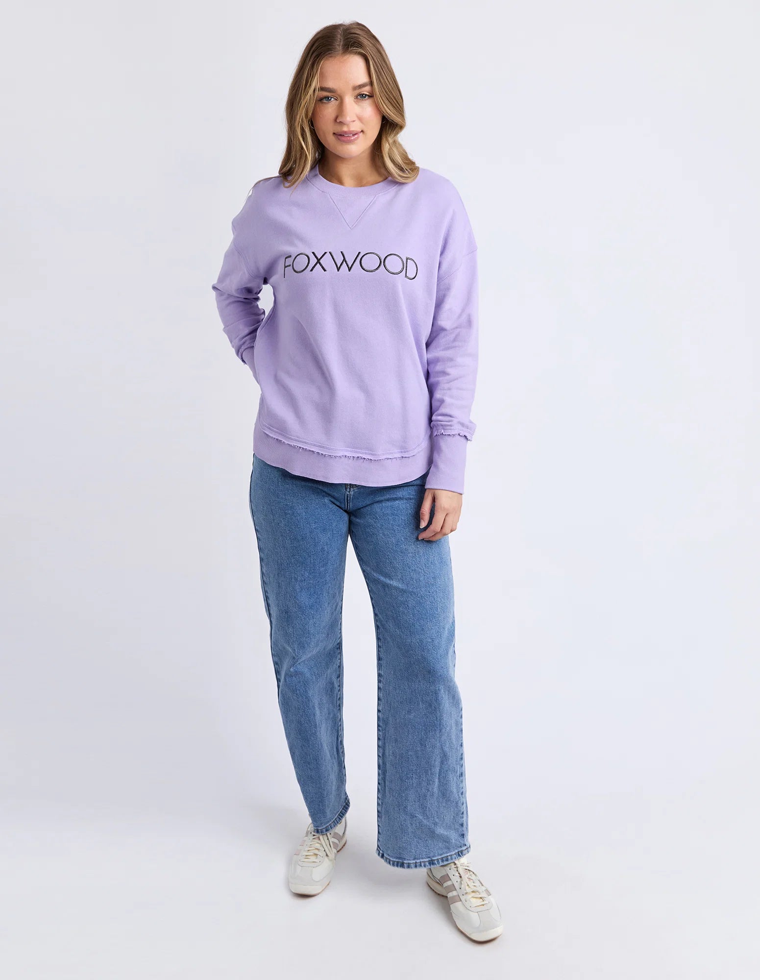 Foxwood Simplified Metallic Crew Lavender sweater, close-up of soft lavender fabric with metallic finish and ribbed collar.