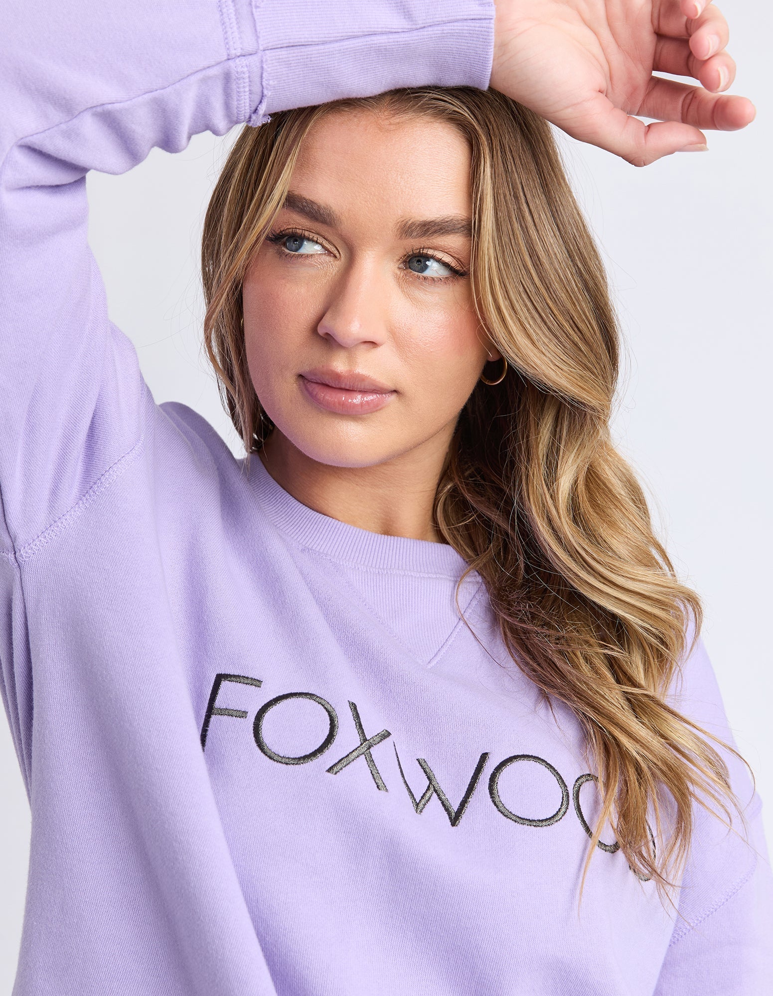 Foxwood Simplified Metallic Crew Lavender sweater, showcasing soft lavender fabric with metallic accents, worn as casual fashion.