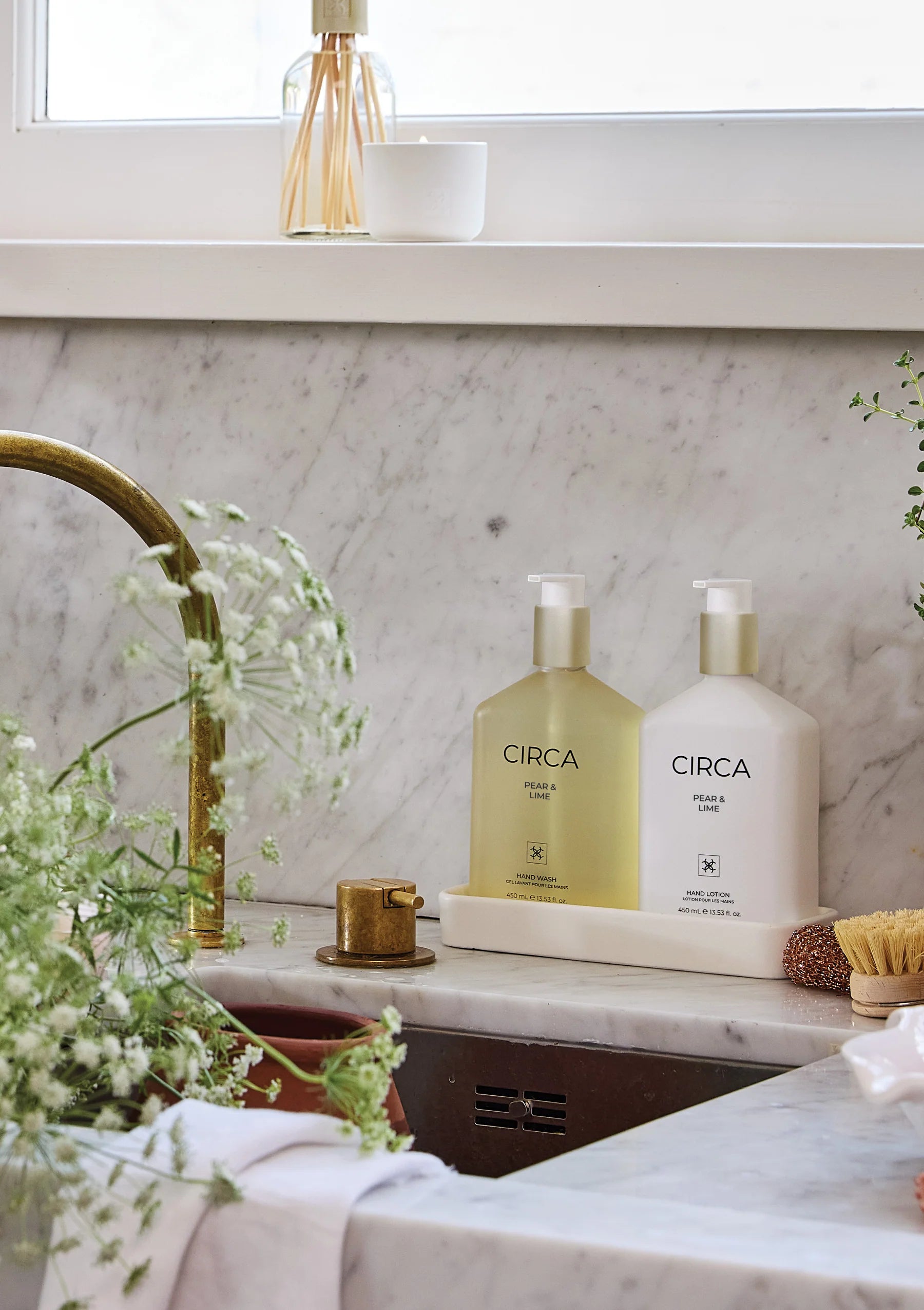 CIrca Pear and Lime hand wash in a 450ml bottle, featuring fresh pear and lime scent with a sleek pump dispenser.