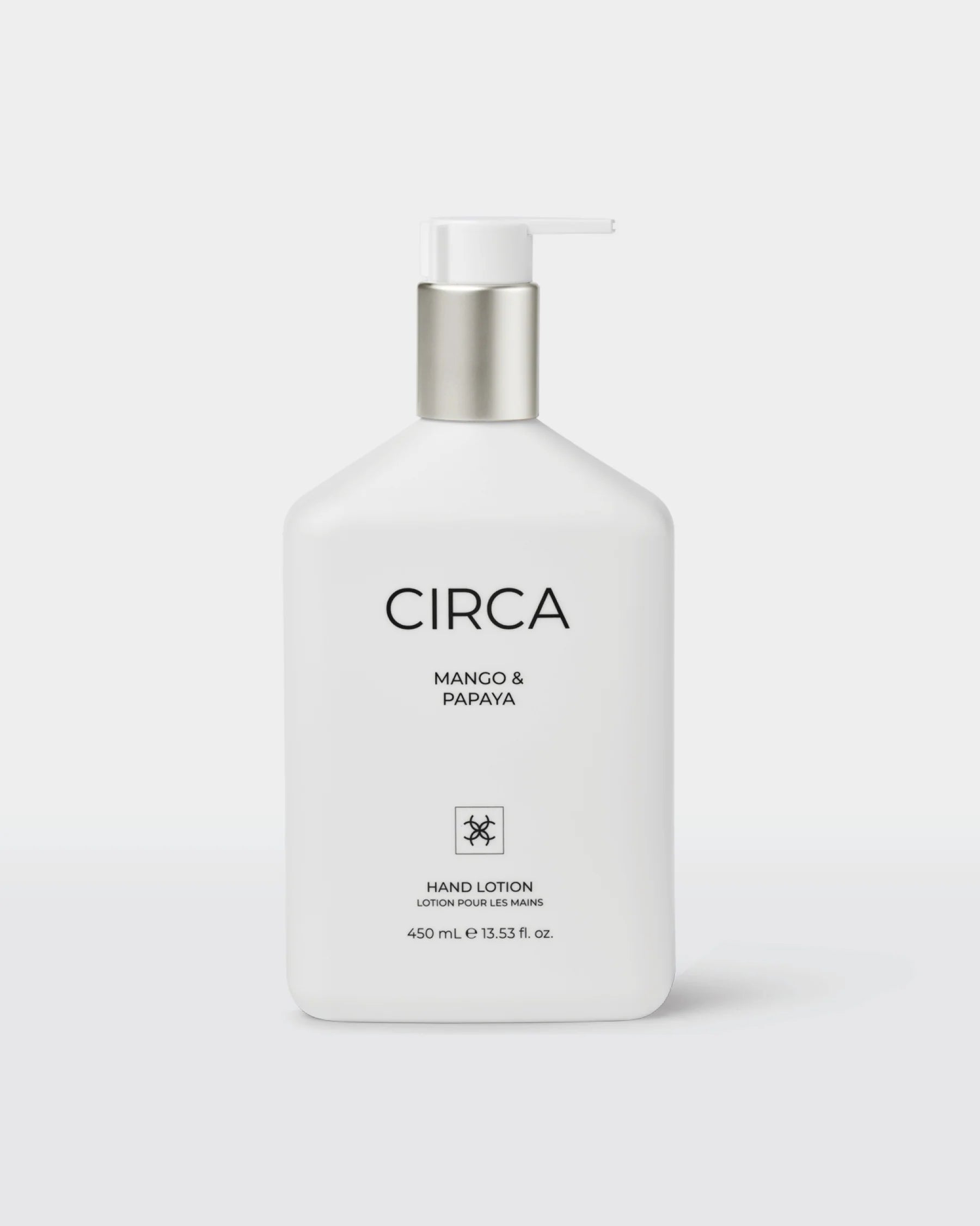 Circa Mango & Papaya hand lotion in 450ml pump bottle, featuring tropical fruit scent and moisturizing formula.