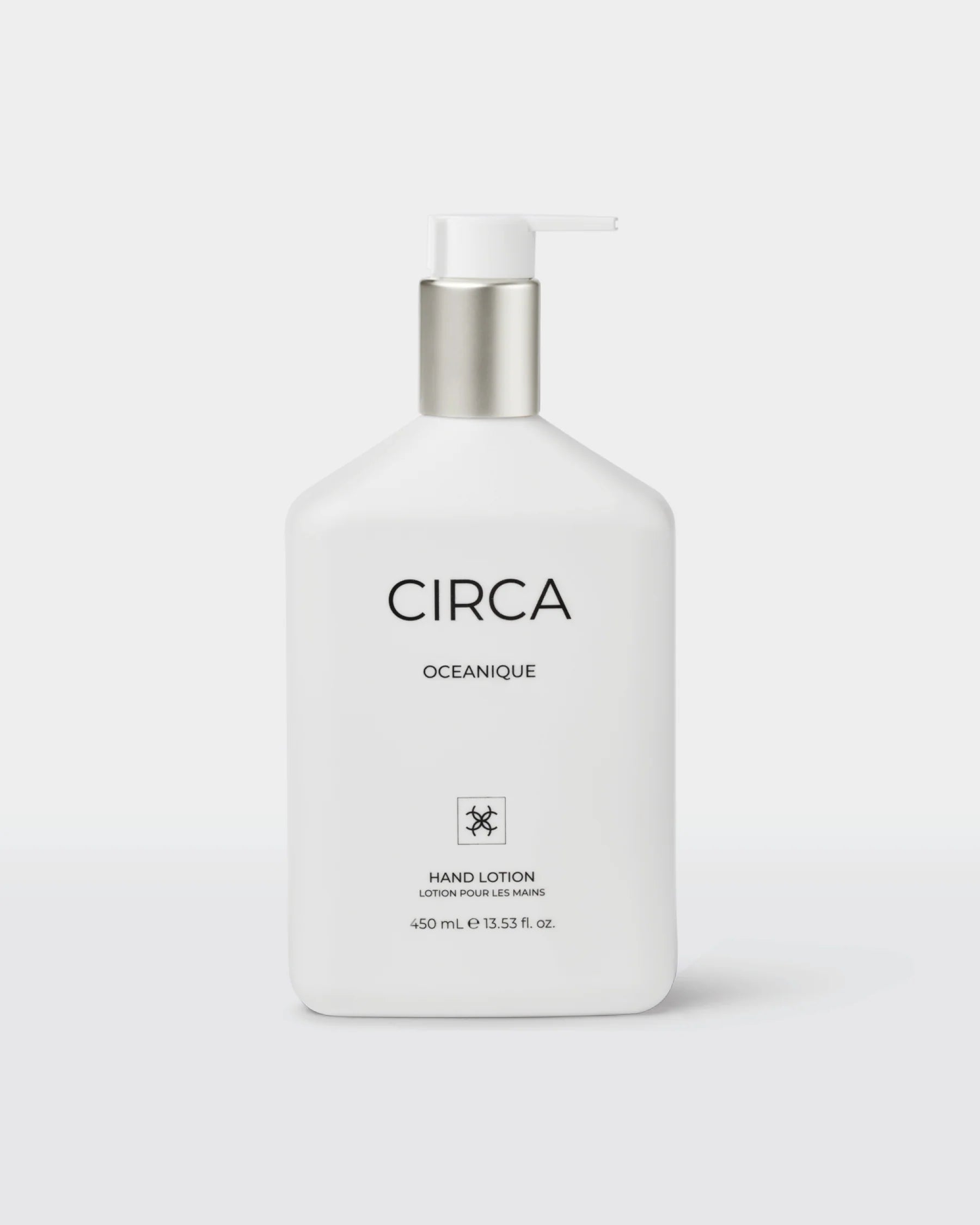 CIrca OCEANIQUE Hand Lotion 450ml bottle with white cap and blue label, showcasing smooth, hydrating lotion for hands.