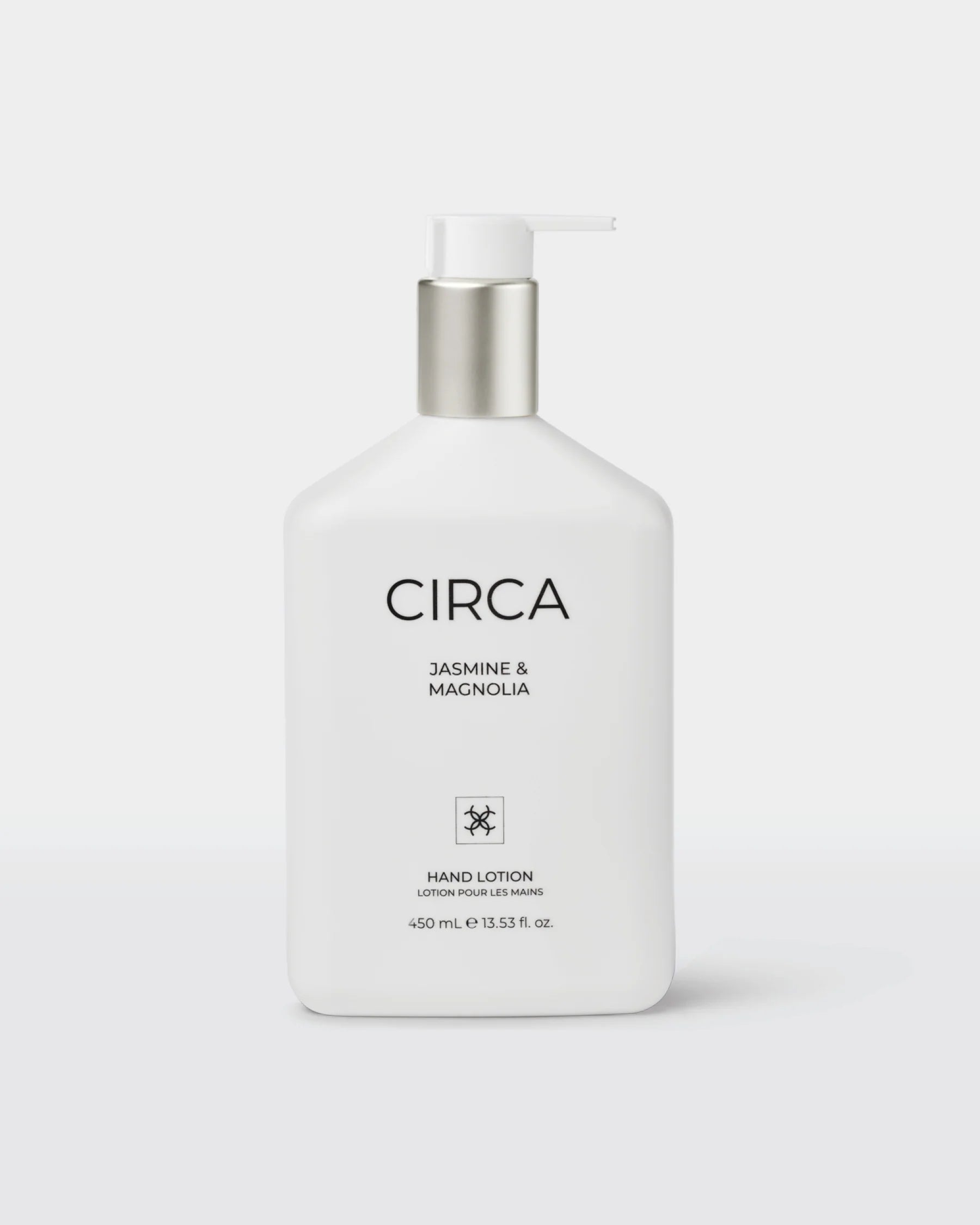 Creamy Jasmine and Magnolia hand lotion in a 450ml bottle by Circa, with floral scent and elegant packaging visible in the image.