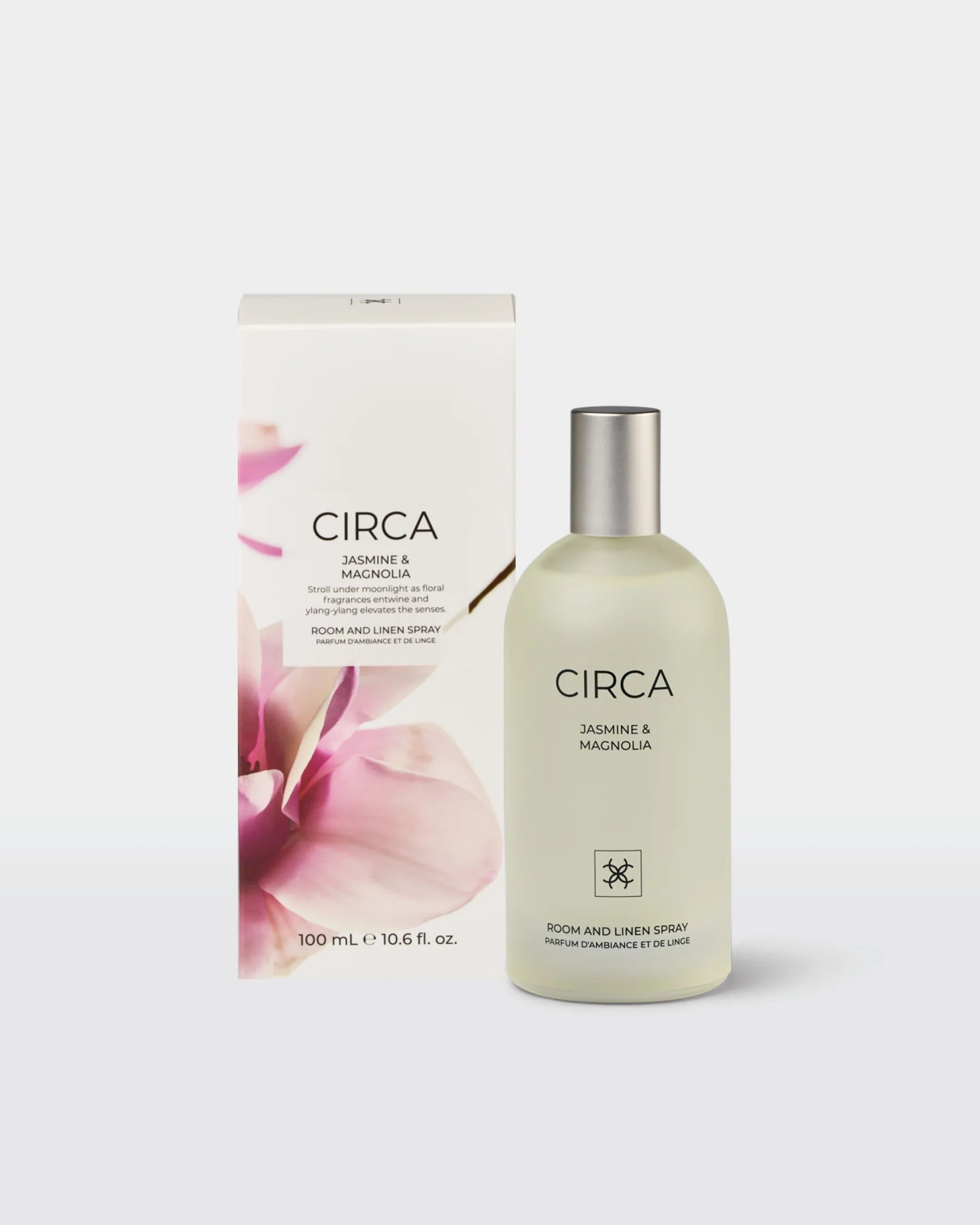 Close-up of CCira Jasmine & Magnolia Room & Linen Spray bottle with floral label design, 100ml size, on a neutral background.