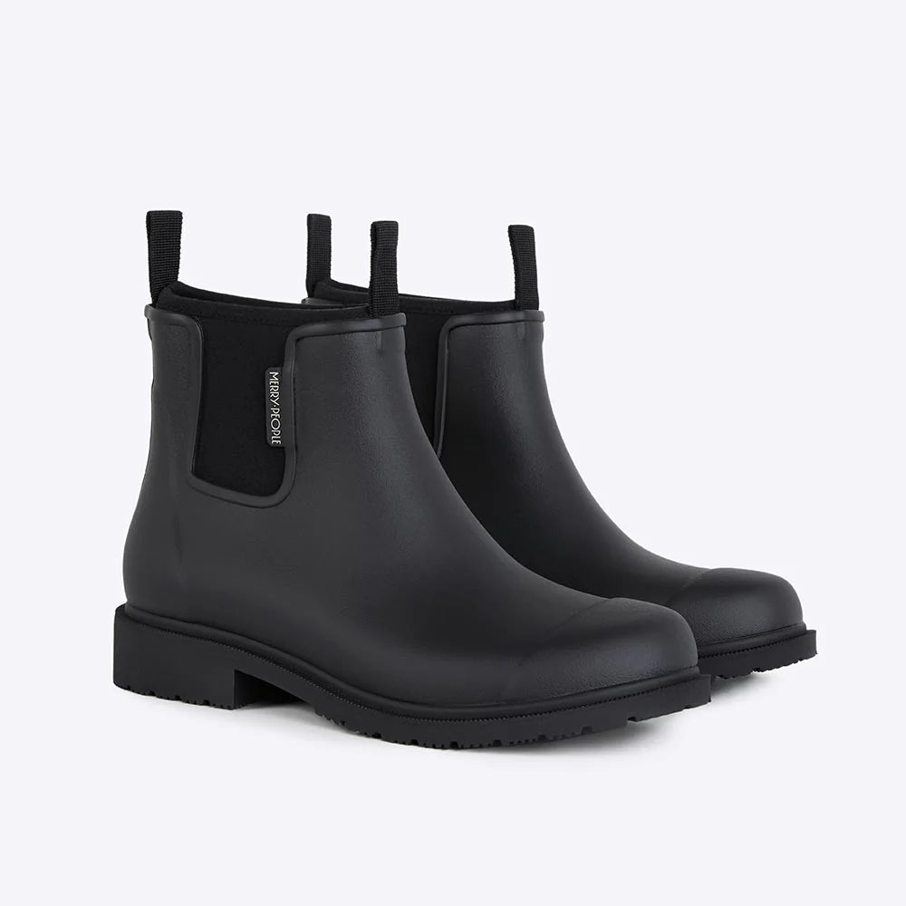 Black Bobbi ankle boot by Merry People featuring sleek design and sturdy sole, perfect for casual or dressy outfits.
