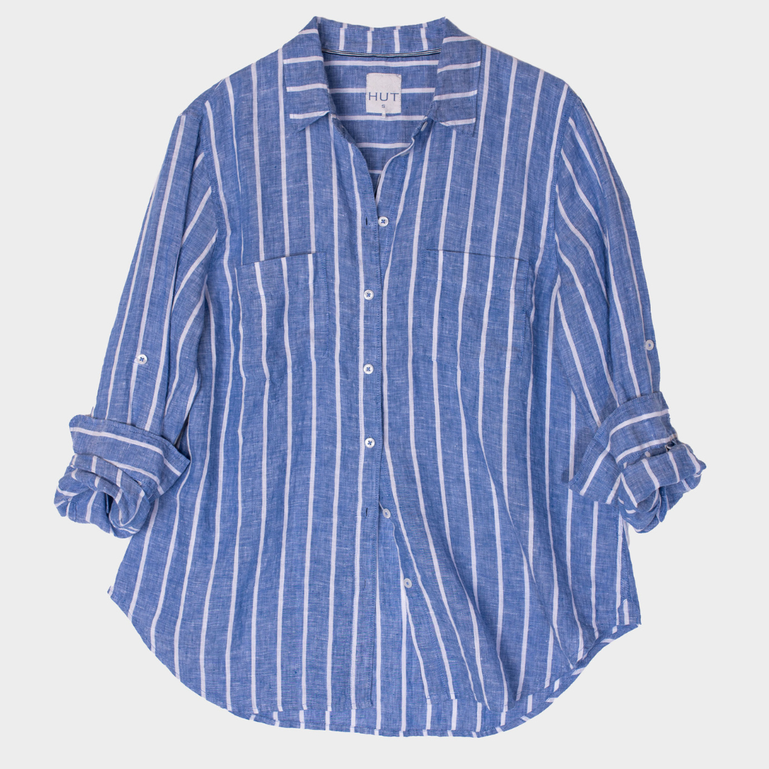 Marine Stripe Boyfriend Linen Shirt by Hut Clothing displayed on a hanger, featuring relaxed fit and nautical-inspired striped design.