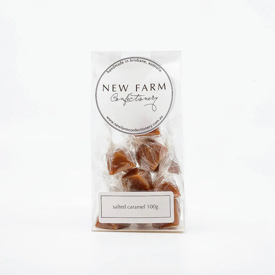 Salted caramel in a 100g package from New Farm, showcasing rich caramel pieces with a hint of sea salt on a white background.
