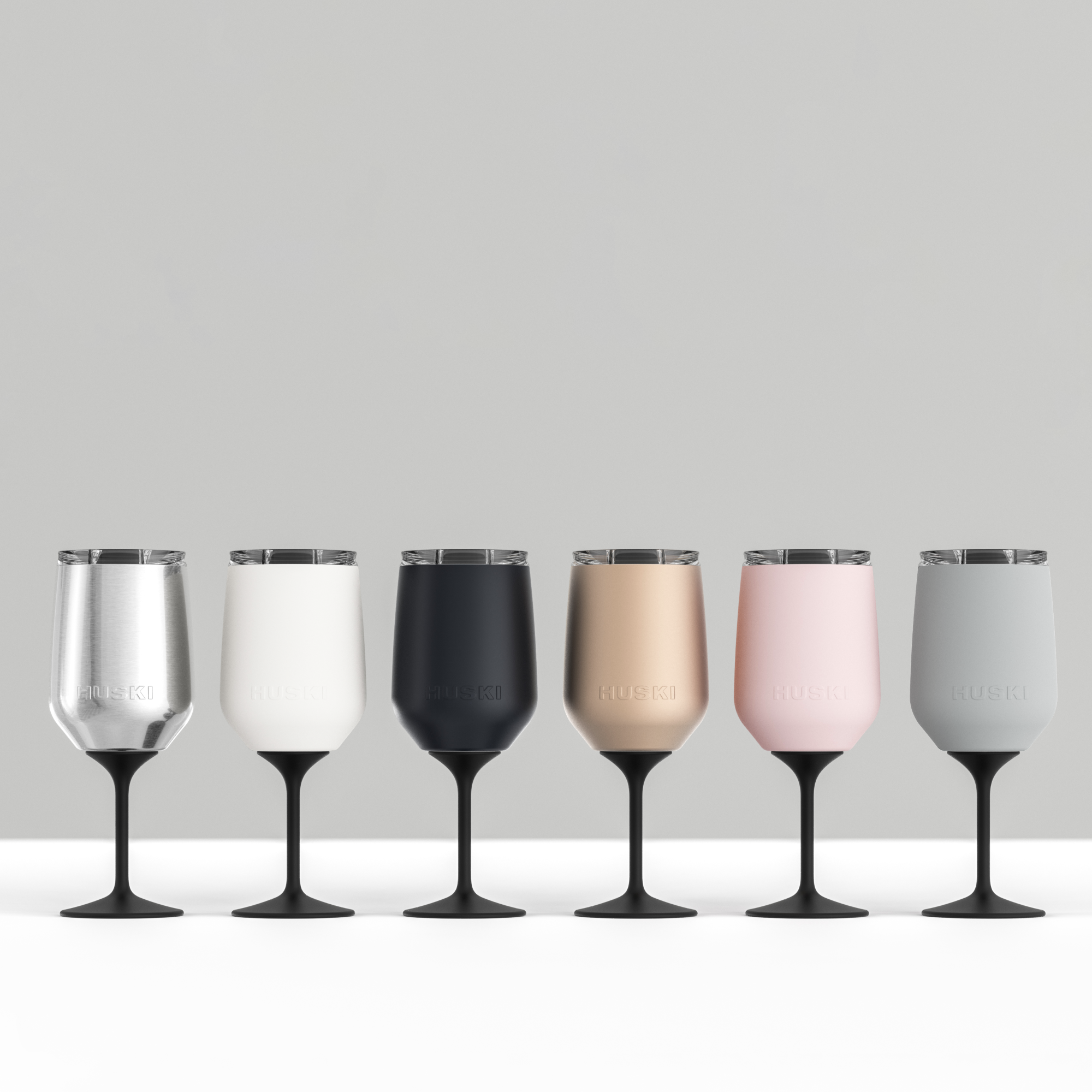 Huski Wine Tumbler 2.0 in black showing a sleek, insulated wine tumbler with a smooth black finish and compact design