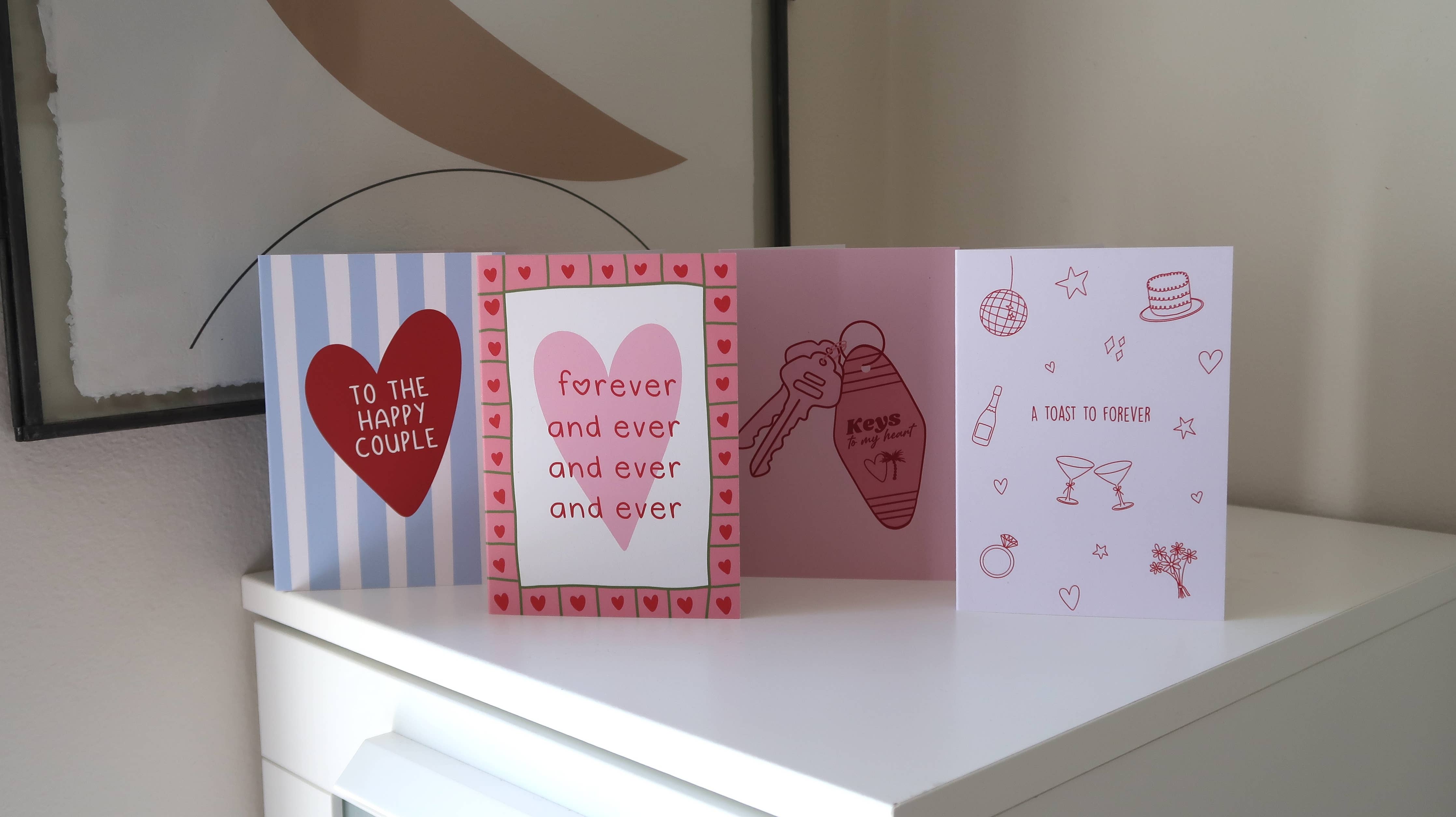 Wedding and engagement card titled "Toast To Forever" by From Rosalie, featuring romantic love-themed design.