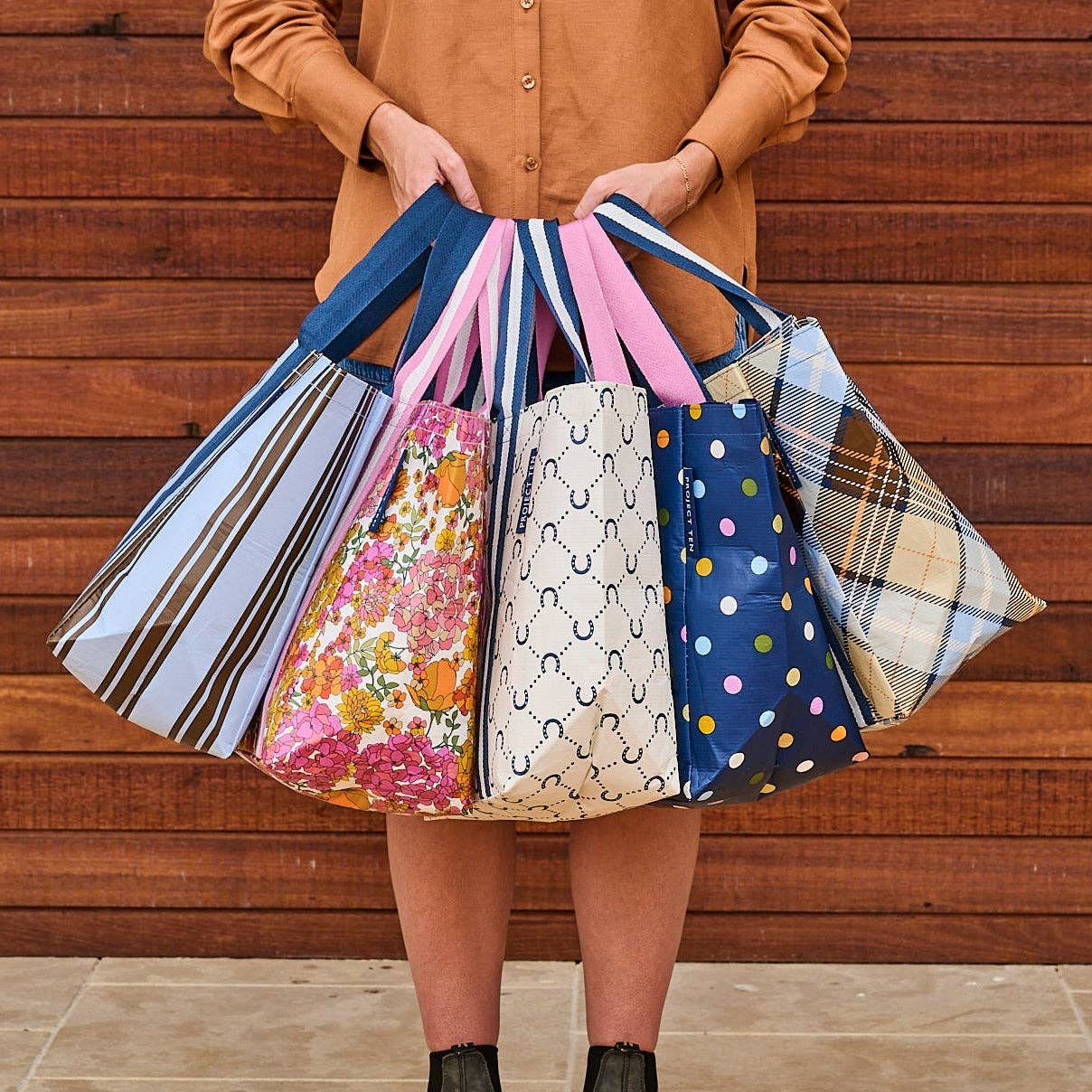 Confetti shopper tote bag by Project Ten Pty Ltd featuring colorful confetti pattern, made of durable fabric for everyday use.