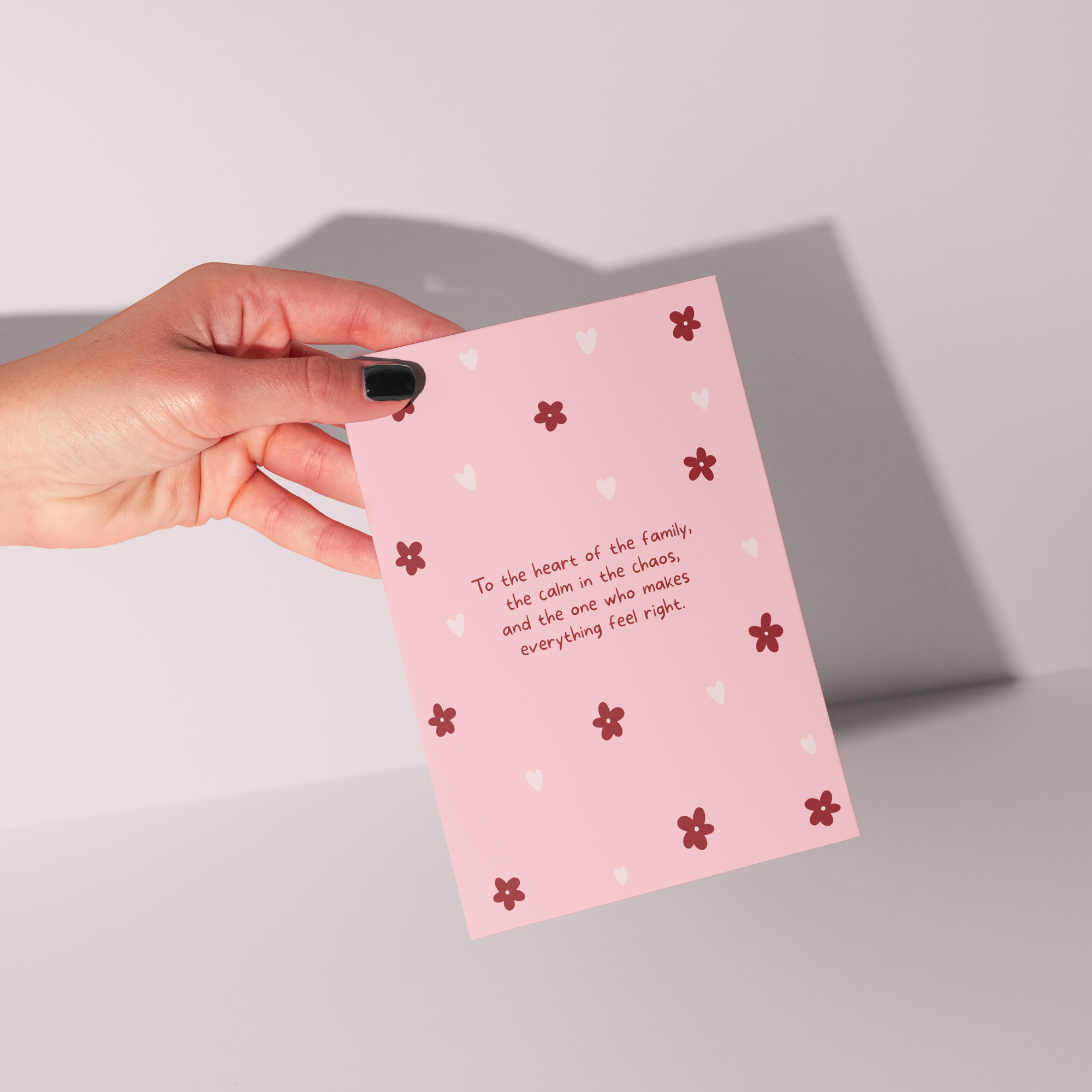 Mother's Day card titled "Heart of the Family" from Rosalie, featuring a heartfelt design with floral accents and elegant lettering.