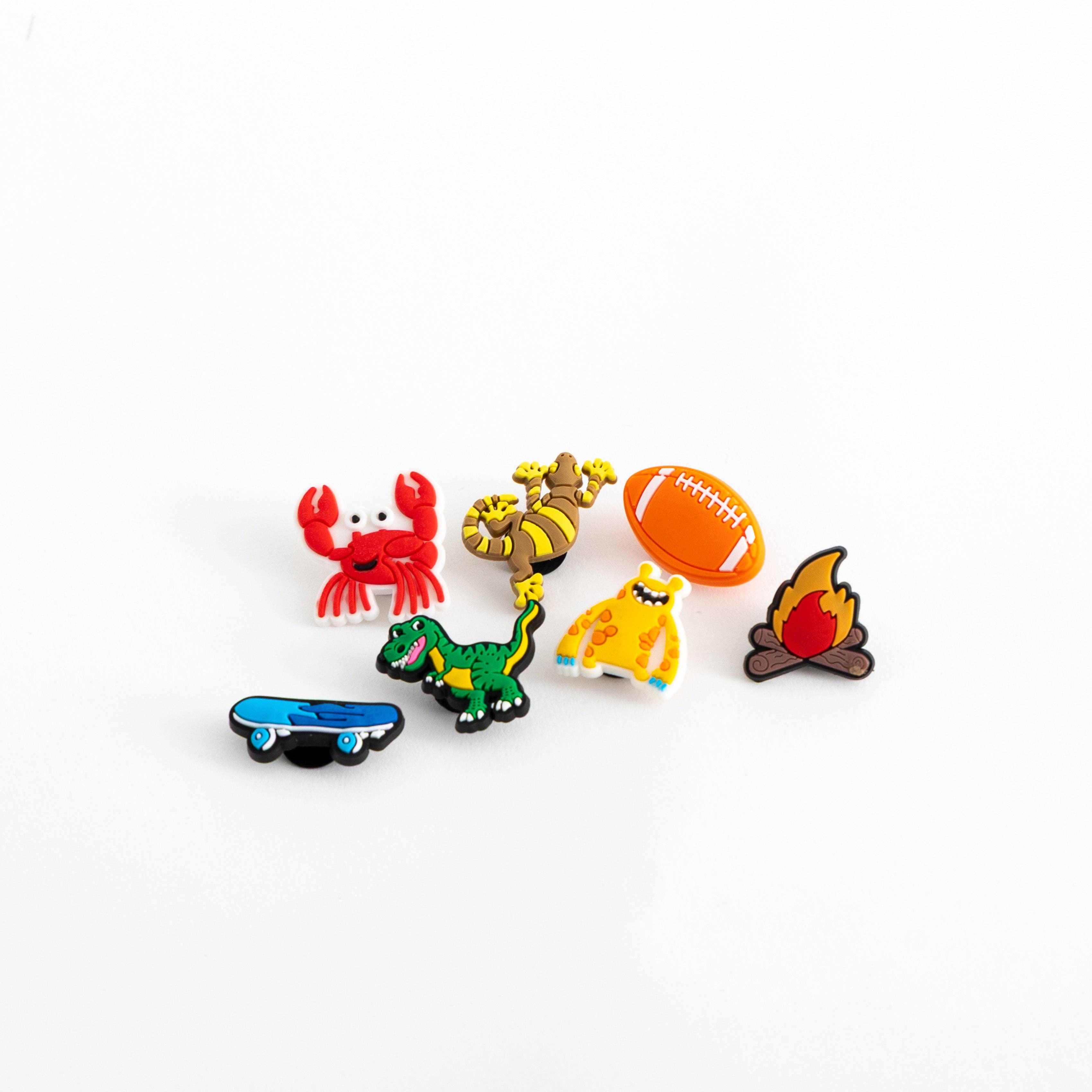 Boys 7-pack Chino Club charm packs with colorful fabric patterns for crafting or decorating clothing accessories.