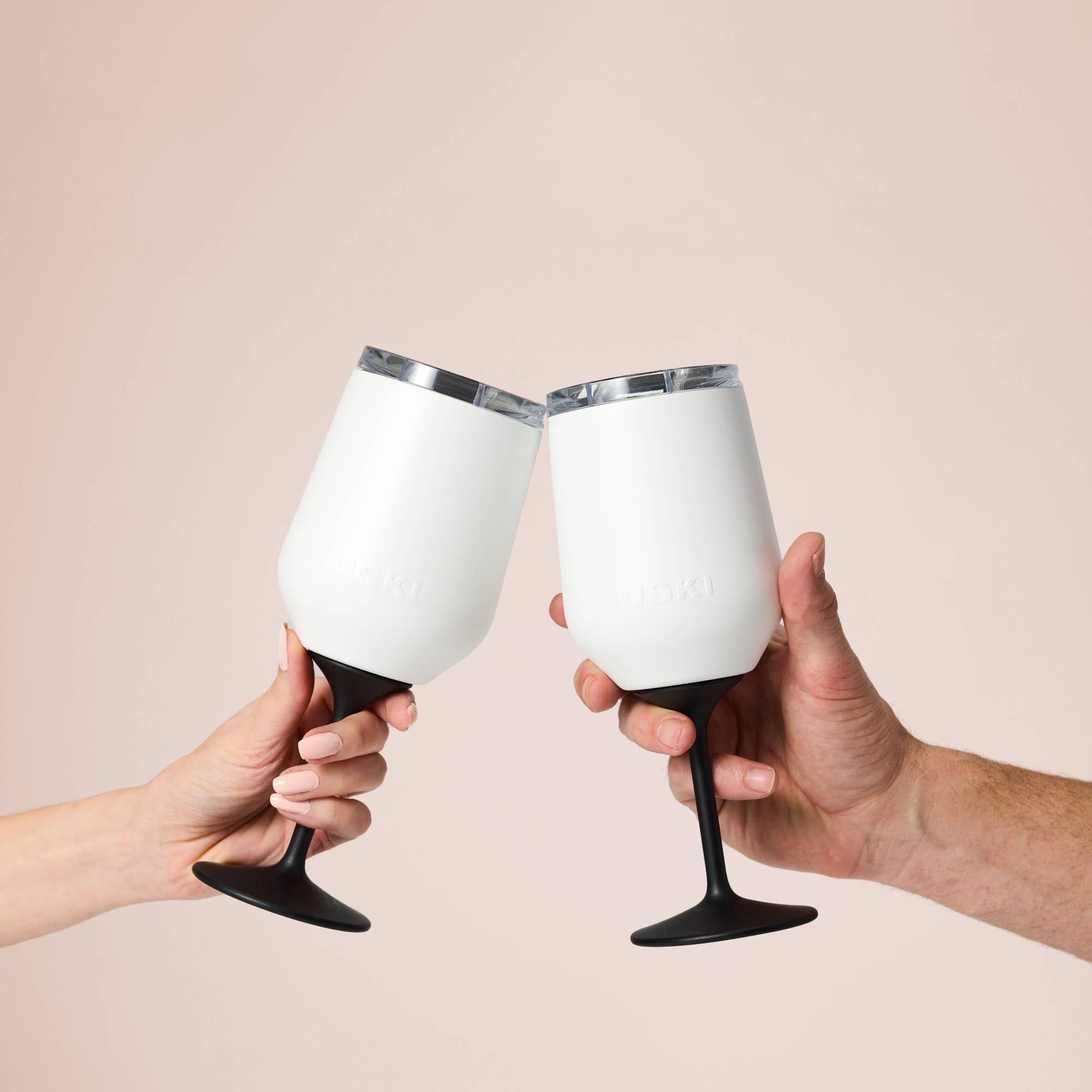 Huski Wine Tumbler 2.0 in white, insulated beverage holder with sleek design and double-wall construction.