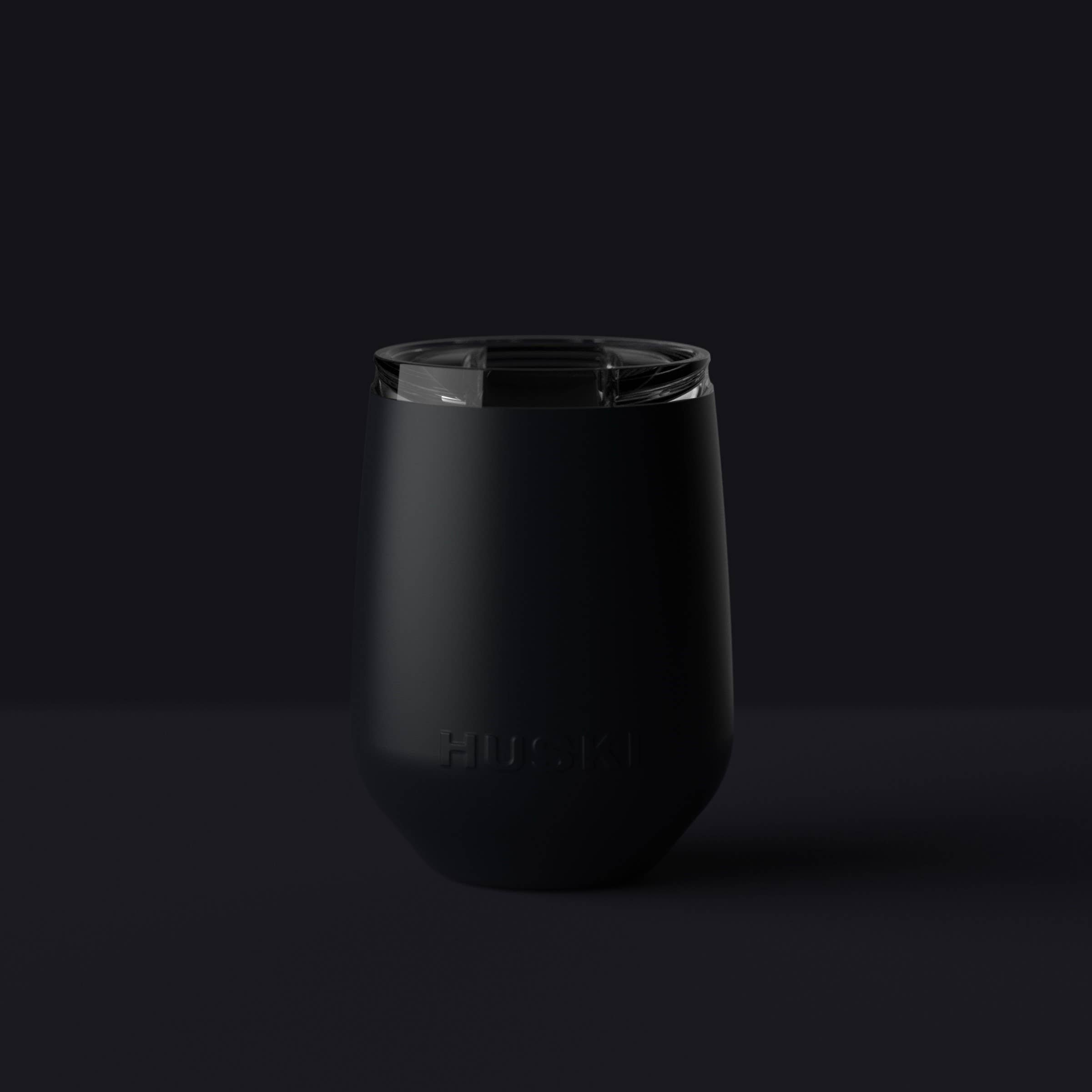 Huski Wine Tumbler 2.0 in black, stainless steel with insulated design, shown with a sleek black finish and lid.